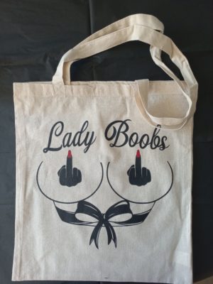sac en tissus beige avec le logo Lady Boobs en noir et rouge dessus
